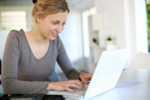 Woman Working on Laptop